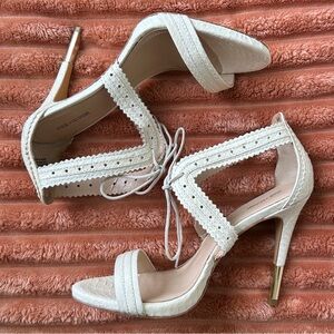 Sophisticated Off White High Heels with Crisscross Straps